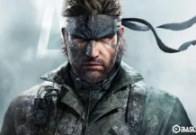 Metal Gear Solid sinema filmi uyarlamasından Solid Snake’in yakın çekim portresi; kirli yüzü, siyah başbandı, sakalı ve askeri üniformasıyla sisli arka planda kararlı bakışıyla ikonik karakter.